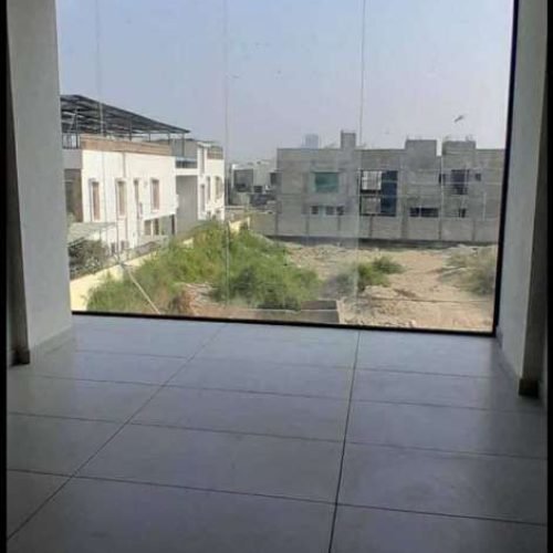 Commercial building for rent in DHA Phase 8 Karachi glass elevation