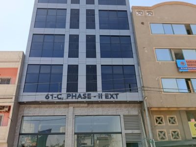 550 SQFT office for rent in DHA Phase 2 Extension – brand new glass elevation building on Main Korangi Road with balcony and lift