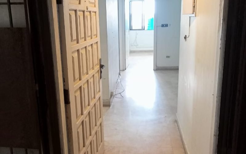 Interior of 2-bedroom apartment with marble flooring