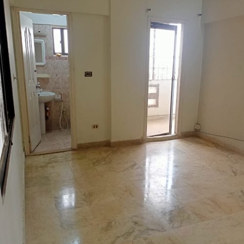 Interior of 2-bedroom apartment with marble flooring
