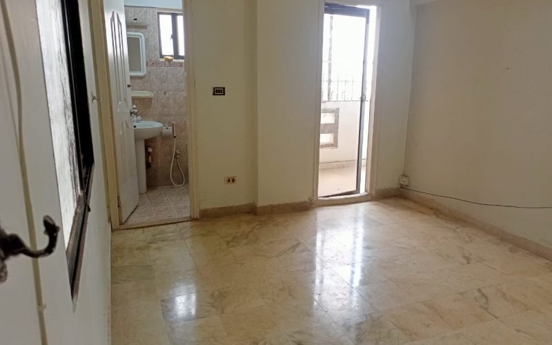 Interior of 2-bedroom apartment with marble flooring