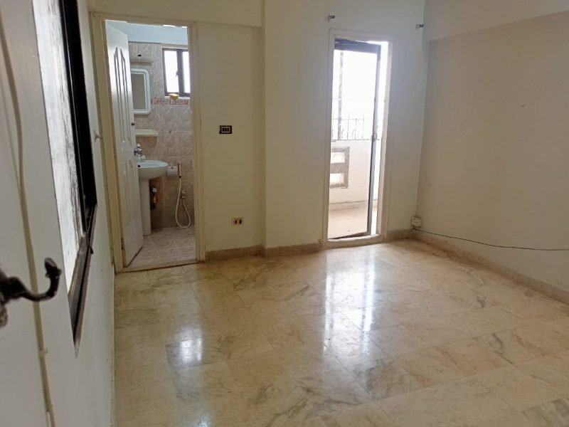Interior of 2-bedroom apartment with marble flooring